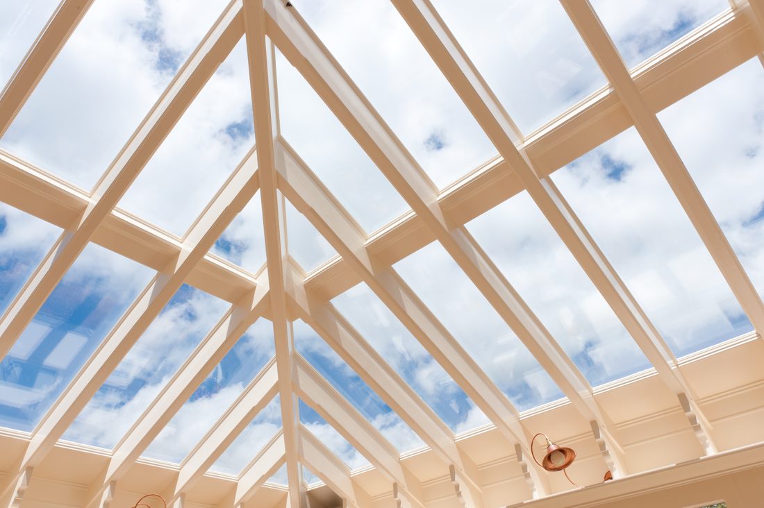 Glass roof panels sealed against the sky
