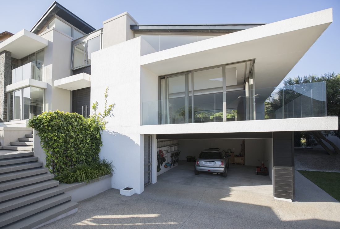 Modern home wrapped in floor-to-ceiling glass