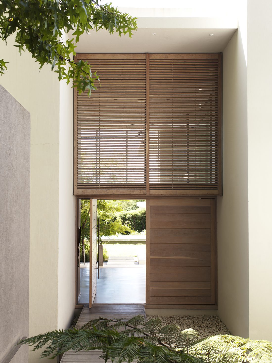Entry doors - a tall wooden entry door
