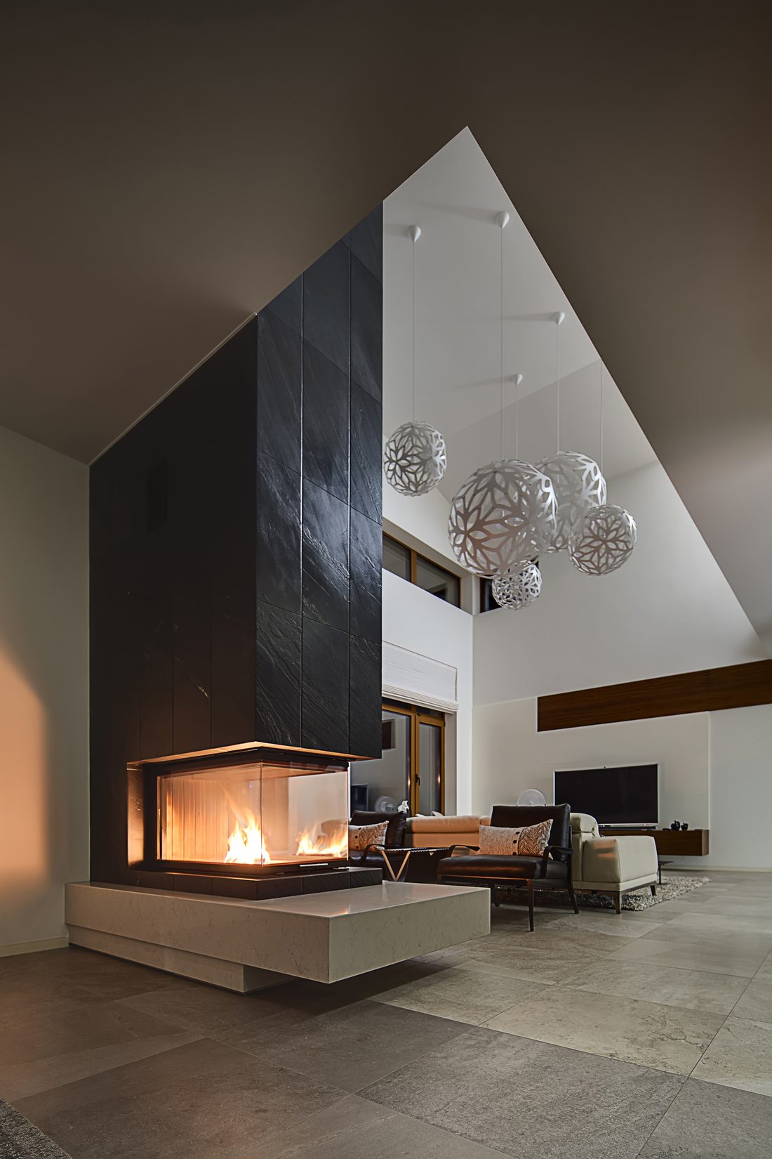 Vaulted living room with tall windows