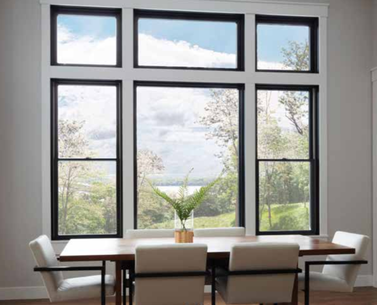 Dining room window wall installed by Family First Remodeling